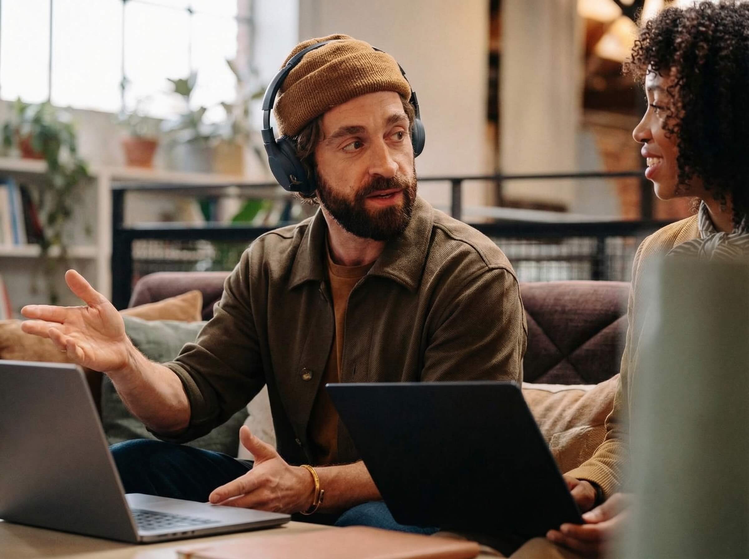 Recruitment professional reviewing candidate shortlists on a modern workspace