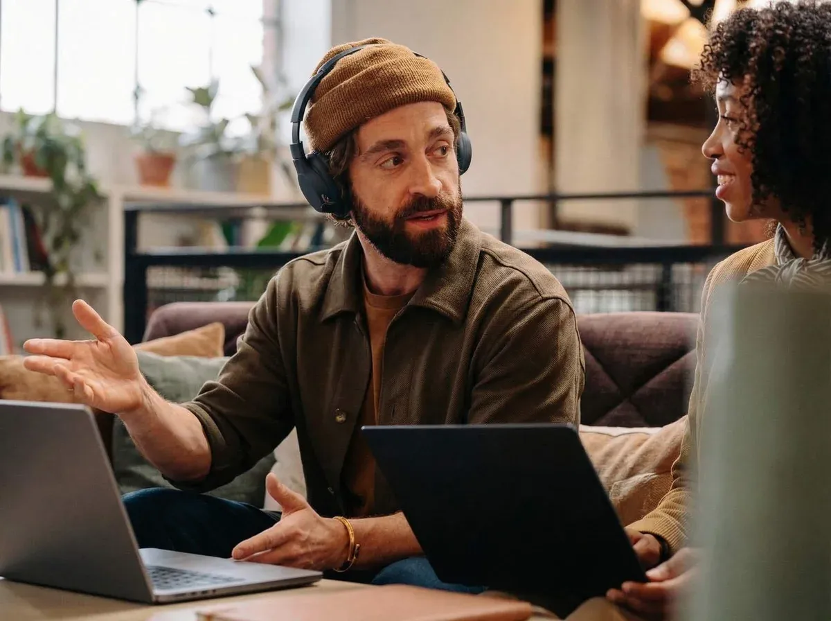 Recruitment professional reviewing candidate shortlists on a modern workspace